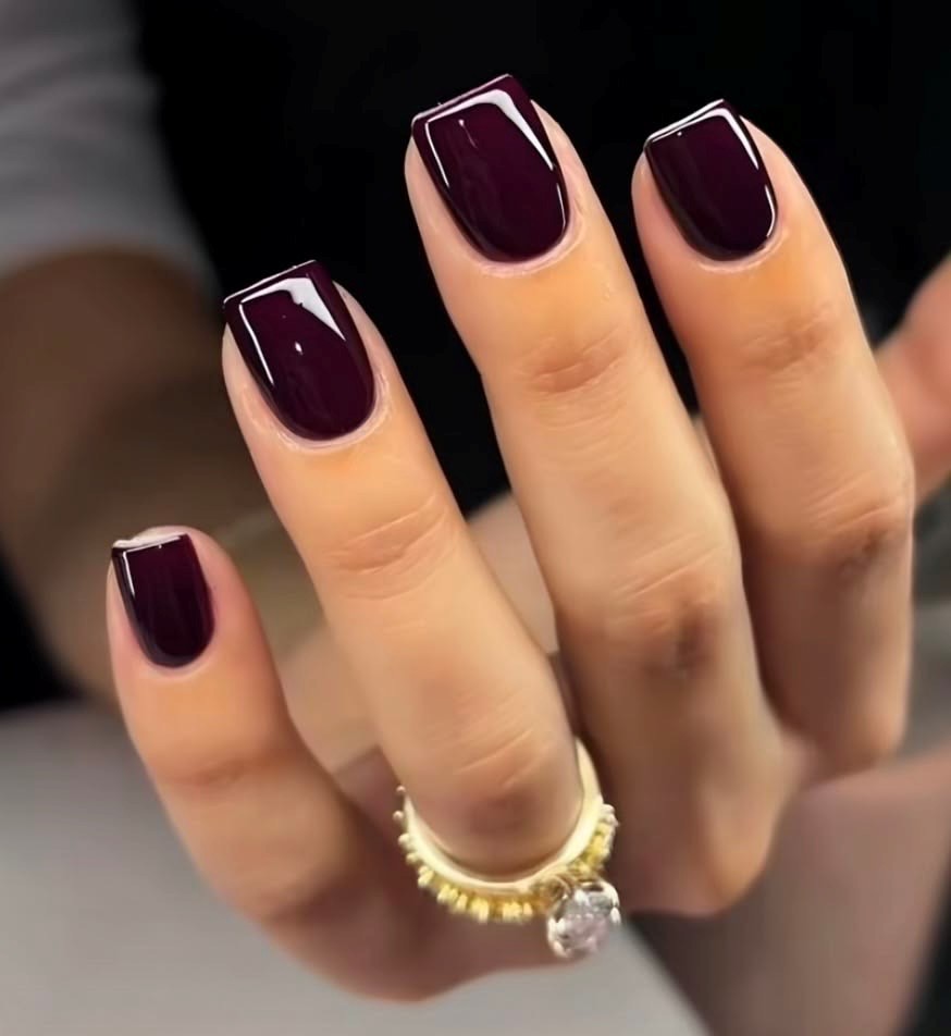 Glossy deep burgundy square manicure at Coastal Polish & Beauty in Newport Beach